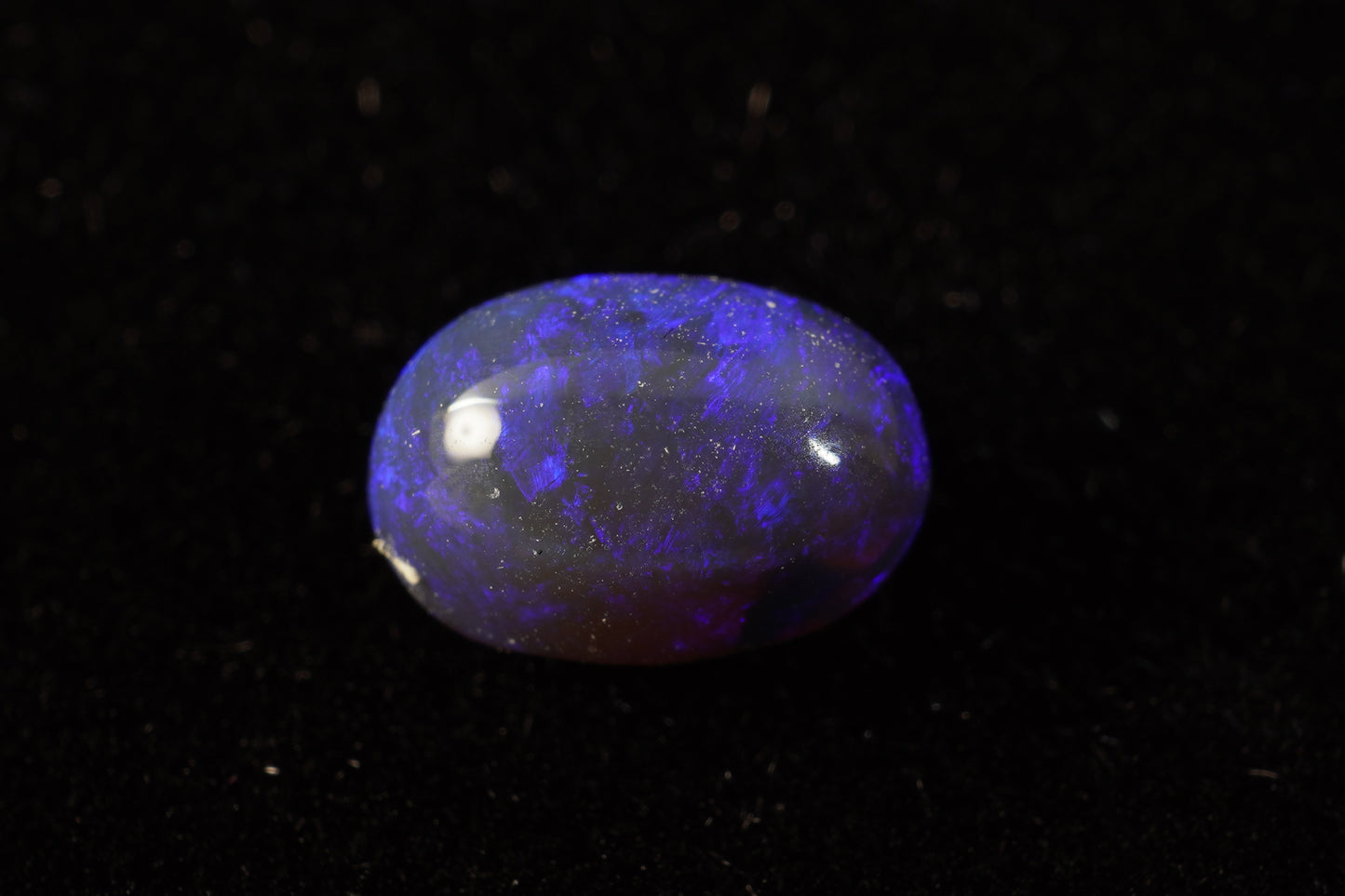 0.94 ct Black Crystal Opal 7.3 x 5 x 3.9mm