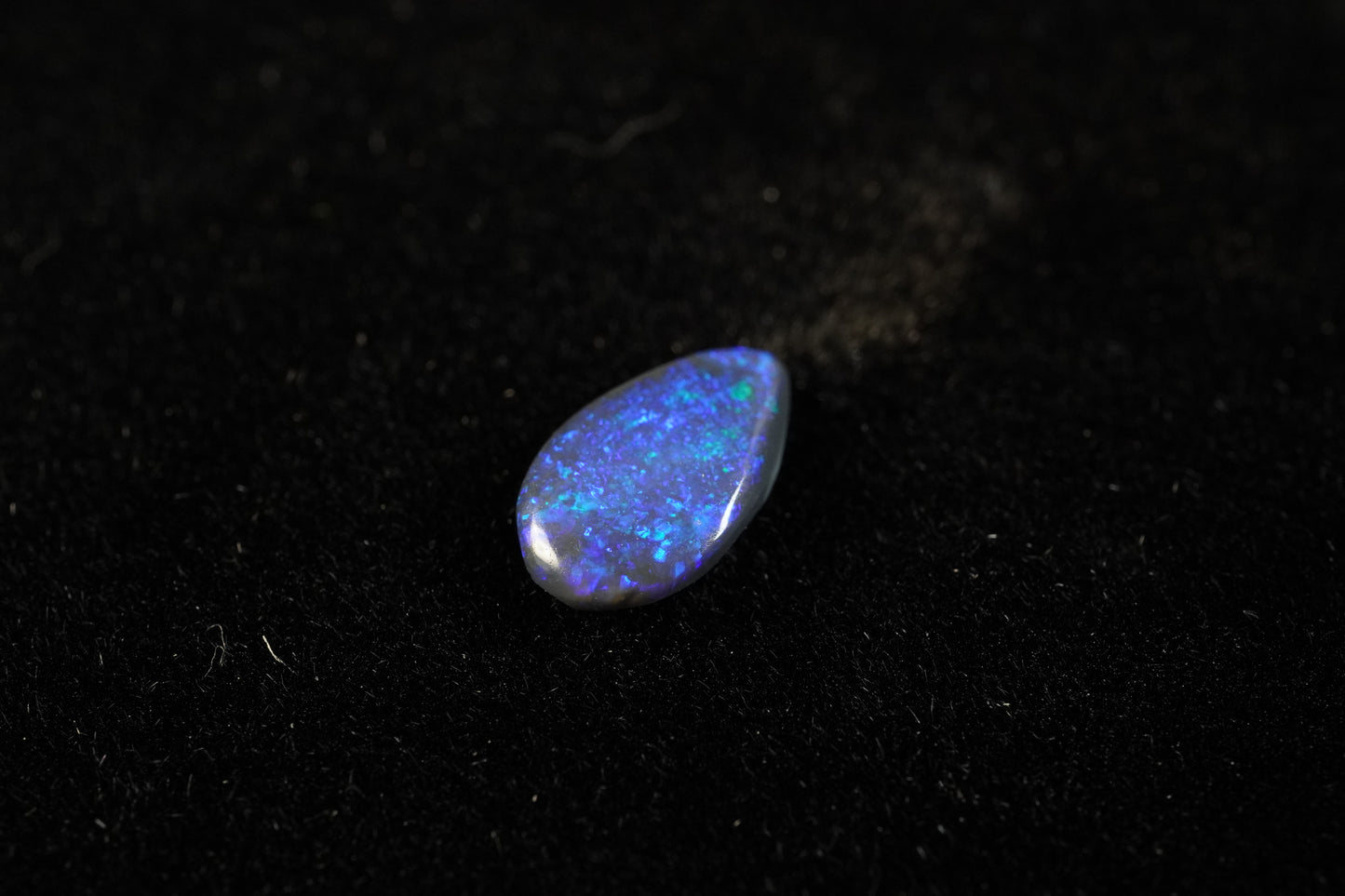 0.56 ct Black Opal 8.8 x 5.2 x 1.8 mm