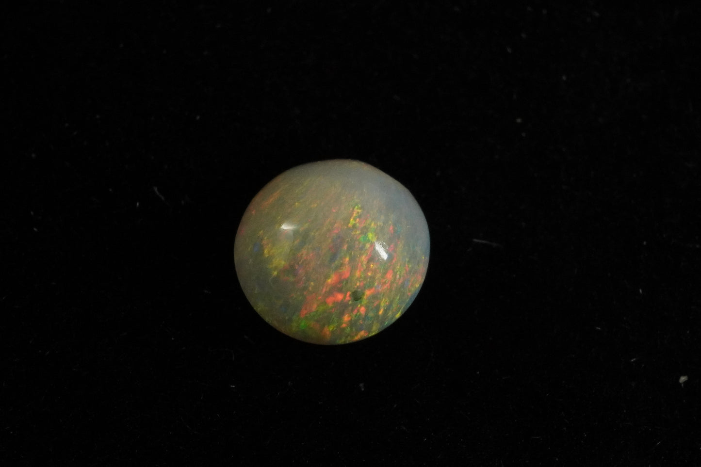 0.6 ct Crystal Opal 5.5 x 3.7mm