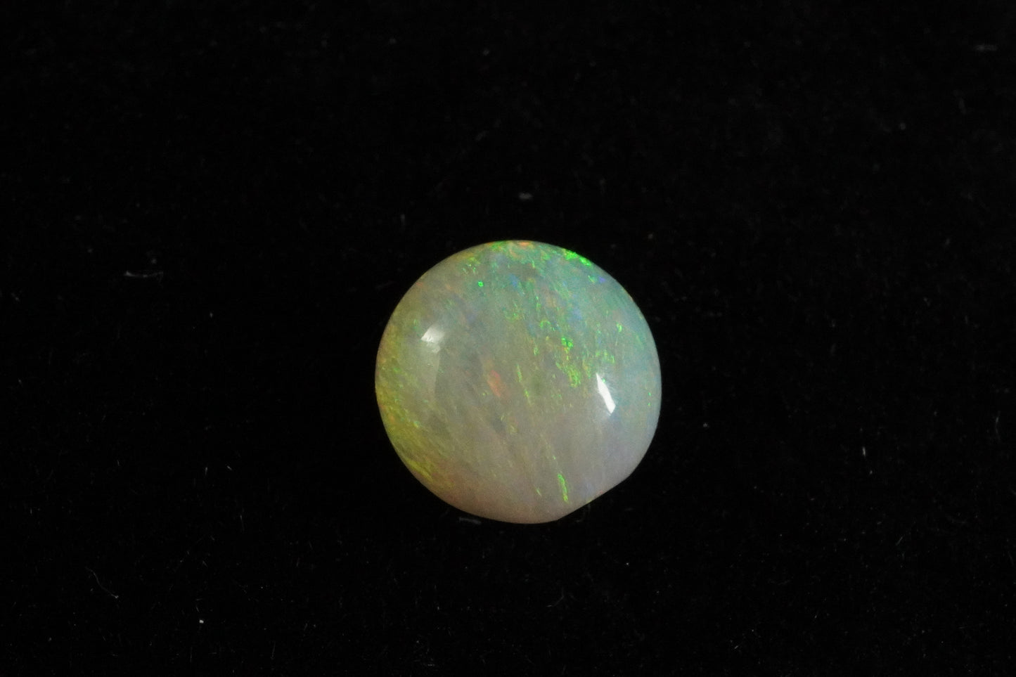 0.6 ct Crystal Opal 5.5 x 3.7mm