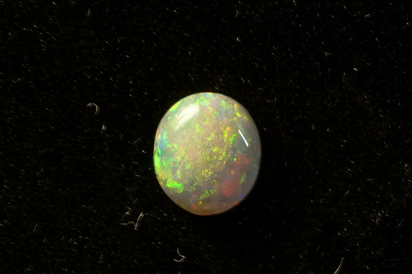 0.43 ct dark crystal opal 6 x 5.2 x 2mm
