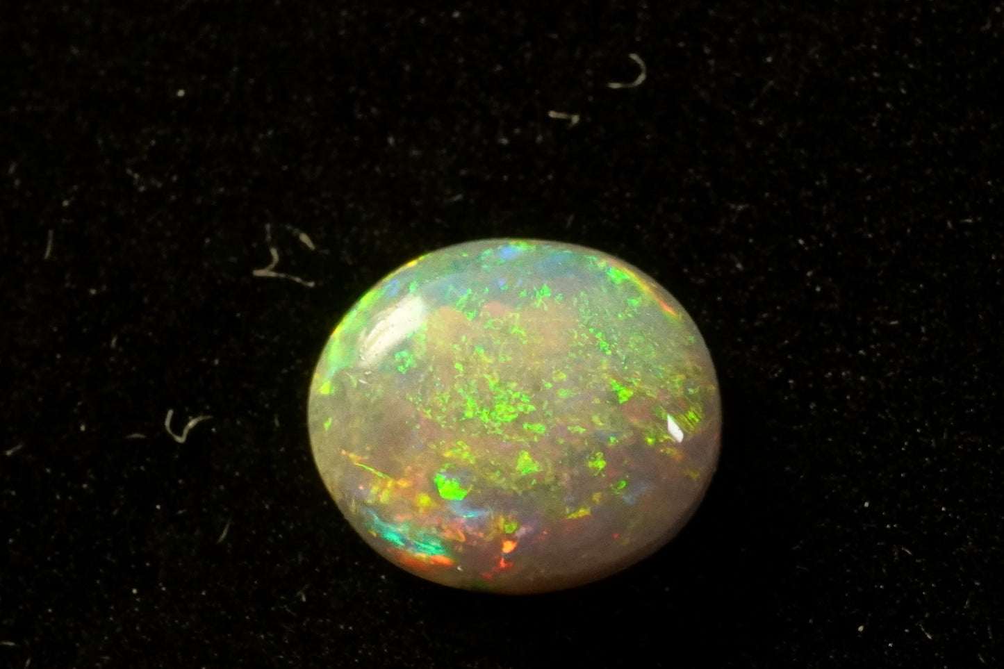 0.43 ct dark crystal opal 6 x 5.2 x 2mm