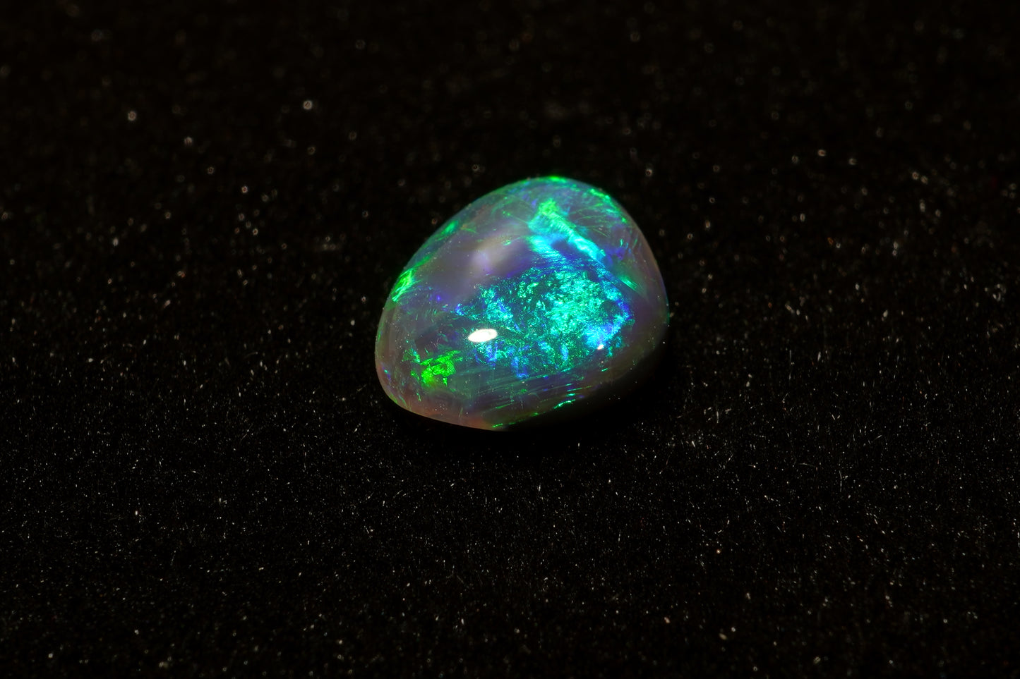 0.69 ct Black Opal 7.3 x 6.2 x 2.5mm