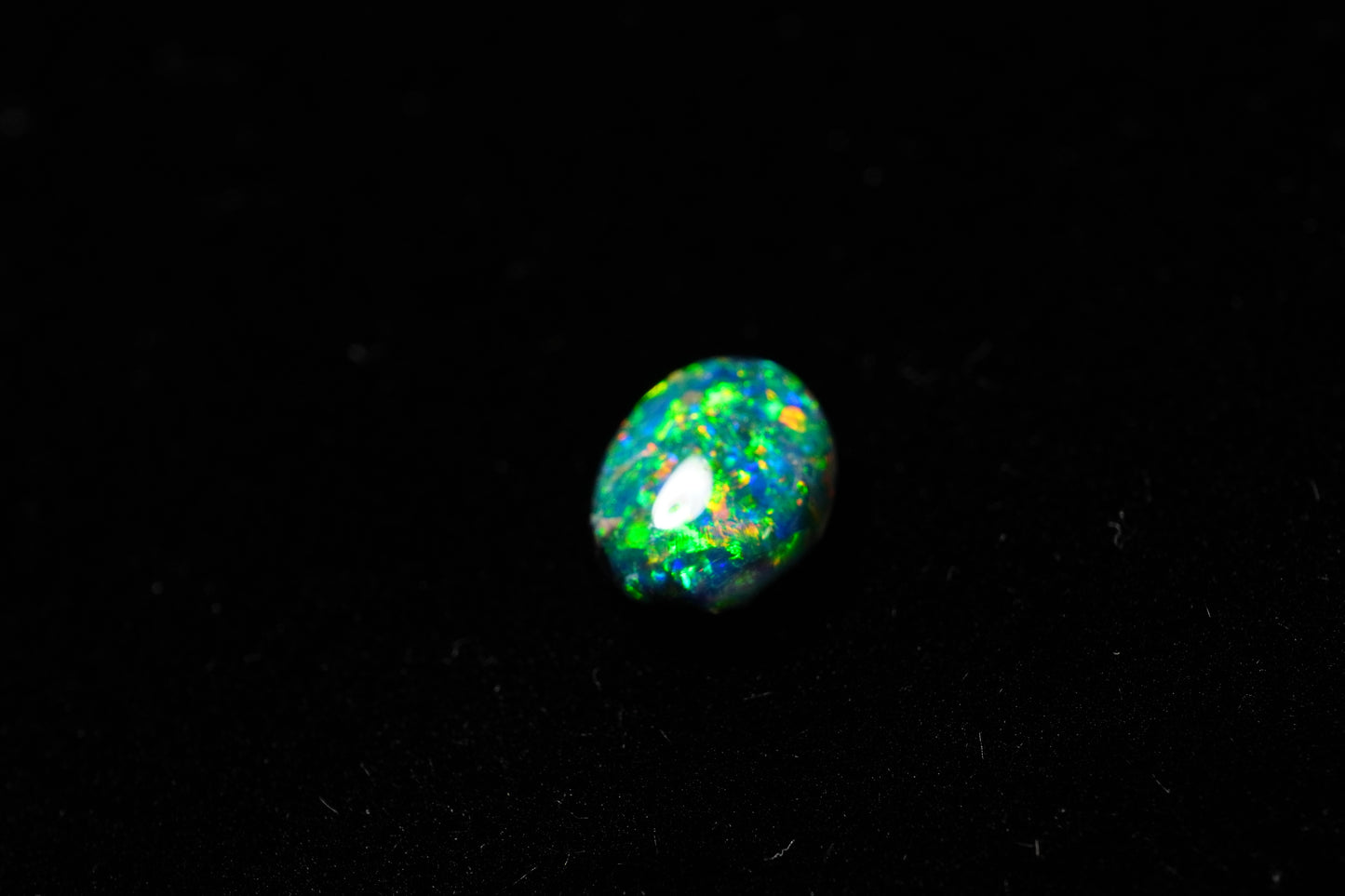 0.64 ct Black Opal 7 x 5.4 x 2.4 mm