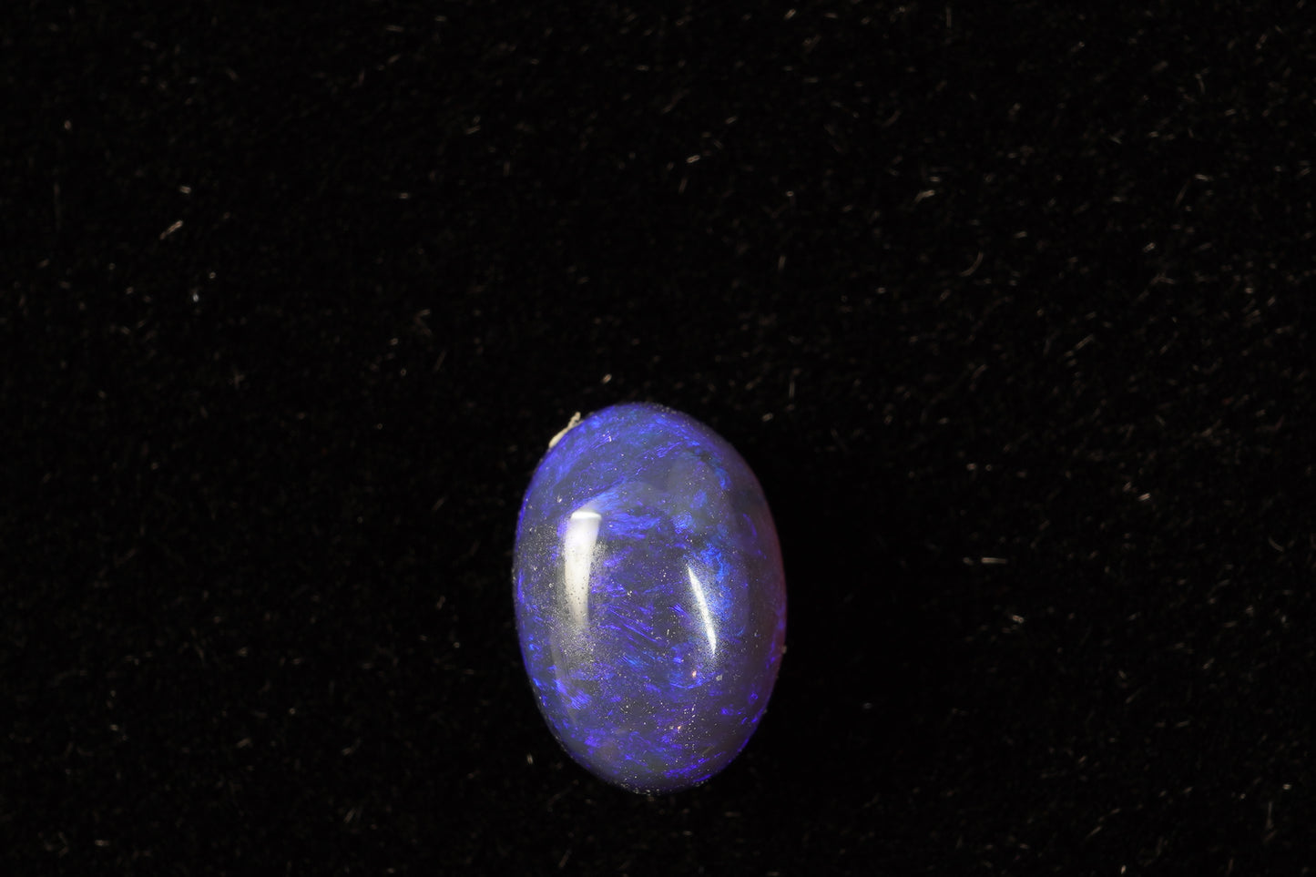 0.94 ct Black Crystal Opal 7.3 x 5 x 3.9mm