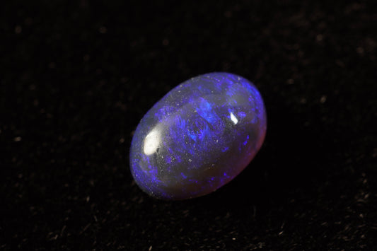 0.94 ct Black Crystal Opal 7.3 x 5 x 3.9mm