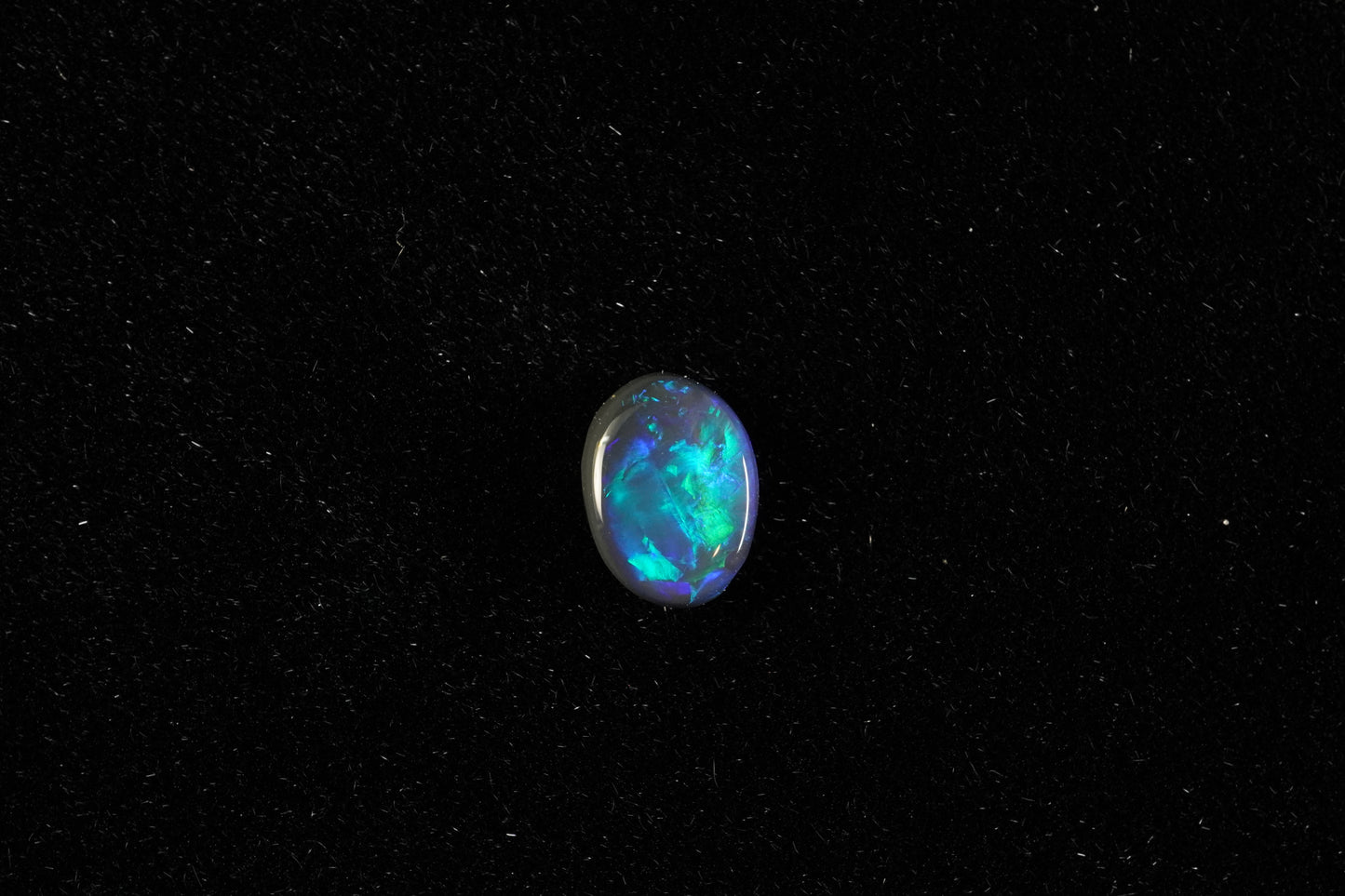 0.4 ct Black Opal 6.5 x 4.8 x 1.7mm