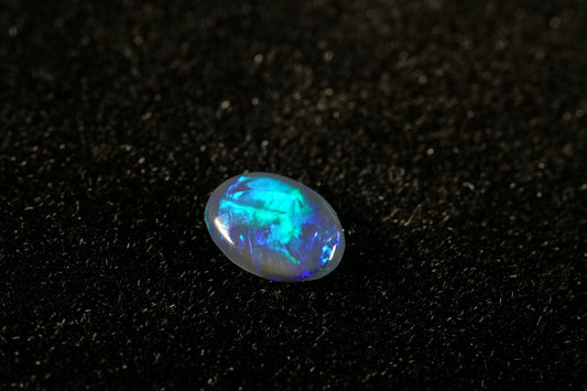 0.4 ct Black Opal 6.5 x 4.8 x 1.7mm