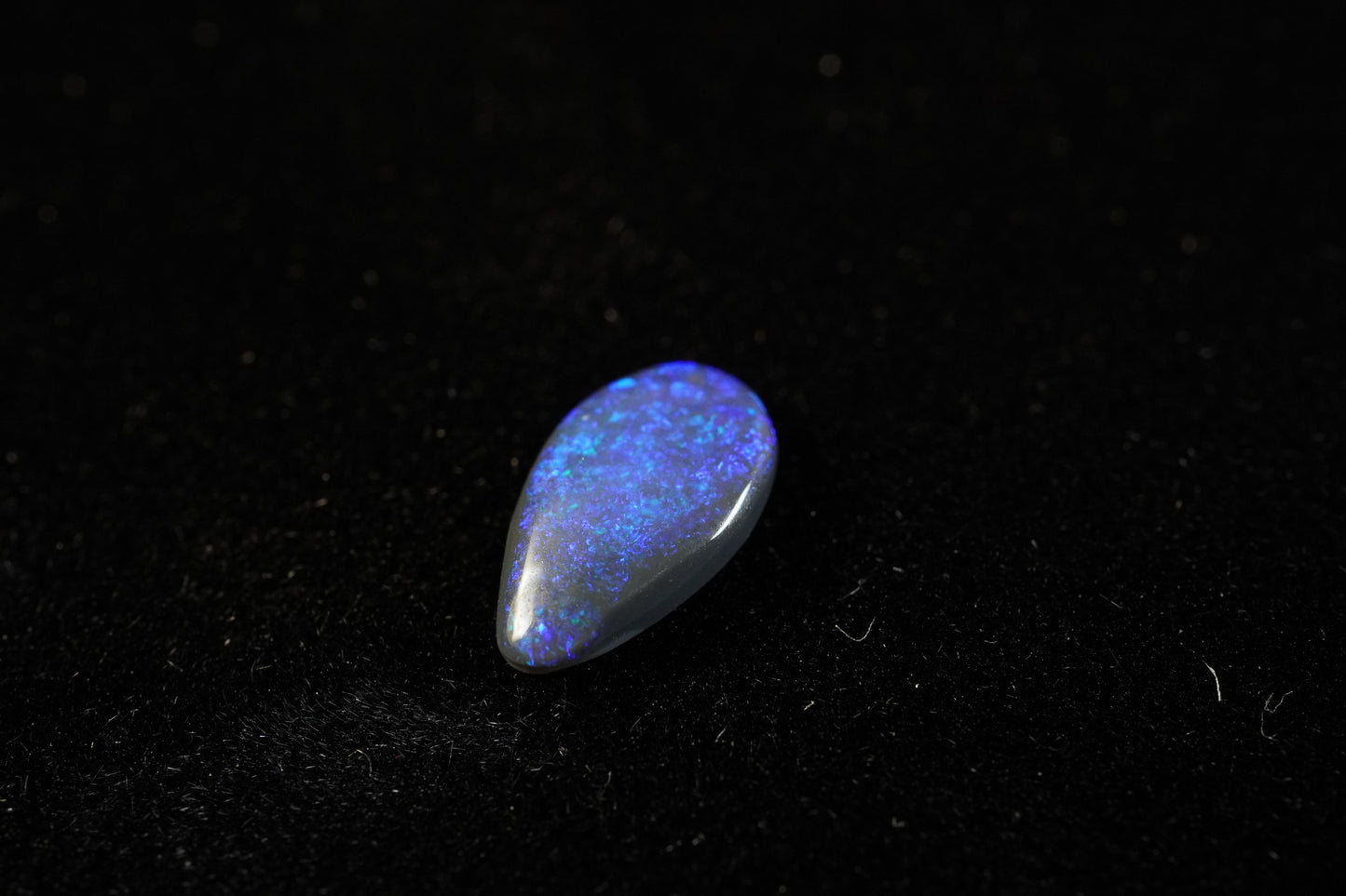 0.56 ct Black Opal 8.8 x 5.2 x 1.8 mm