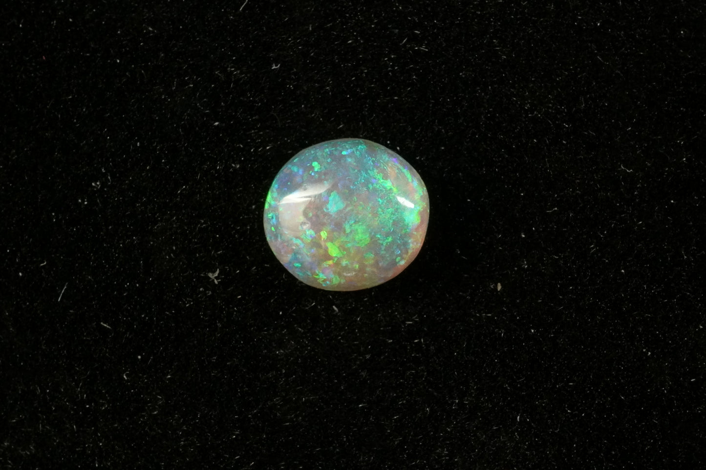0.72 Dark Crystal Opal 6.5 x 5.8 x 2.8 mm