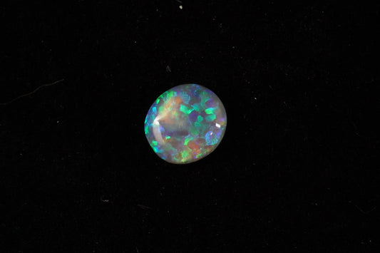 0.79 ct Dark Crystal Opal 7.3 x 6.5 x 2.2 mm
