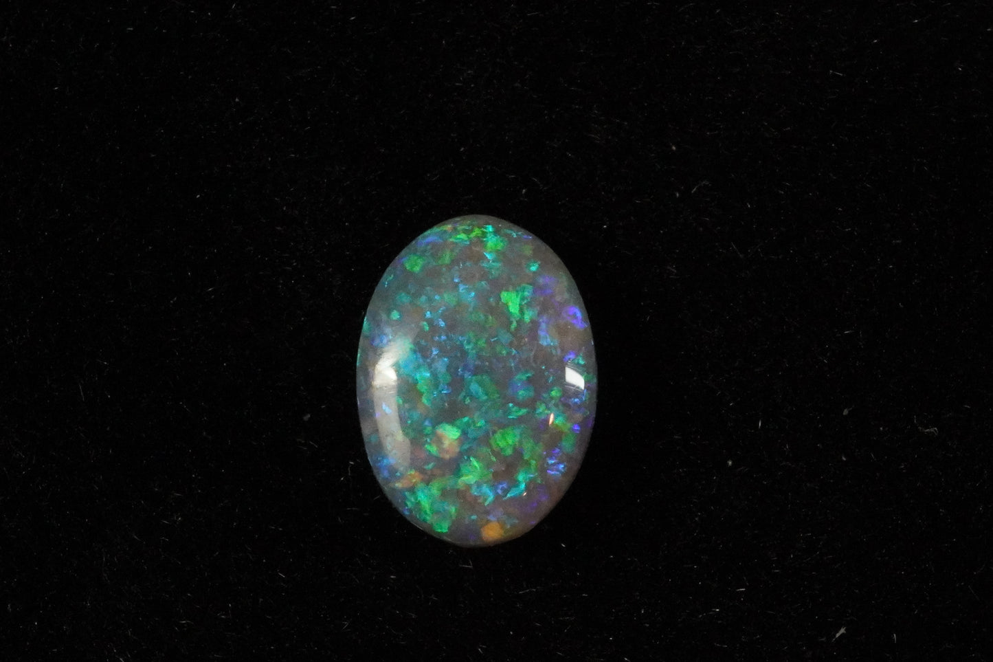 0.45 ct Dark Crystal Opal 6.8 x 4.9 x 1.9 mm