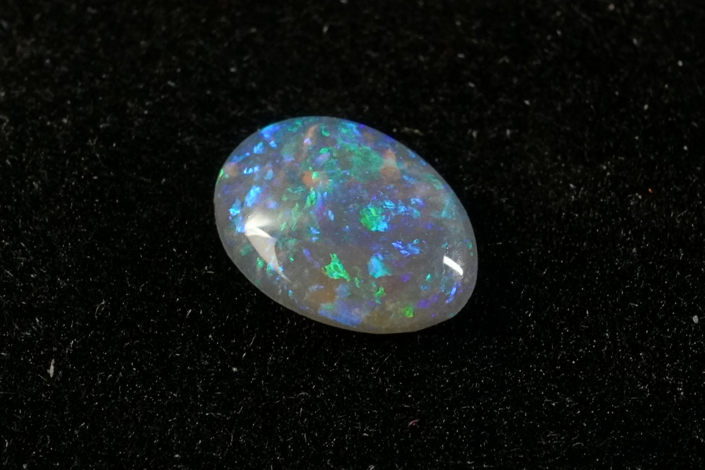 0.45 ct Dark Crystal Opal 6.8 x 4.9 x 1.9 mm