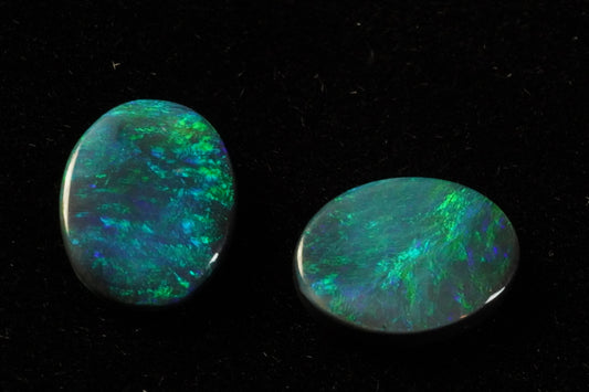 1.25 ct black opal pair 8.3 x 6.2/6.3 x 1.4