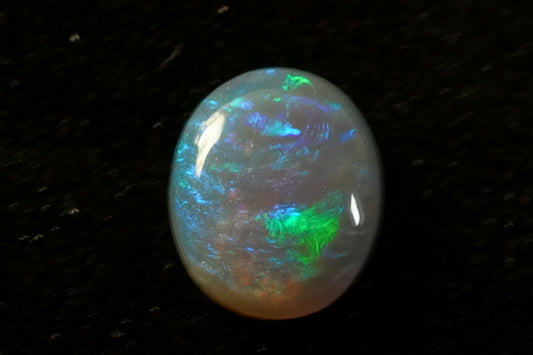 0.52 ct Dark Crystal opal 6.7 x 5.4 x 2mm