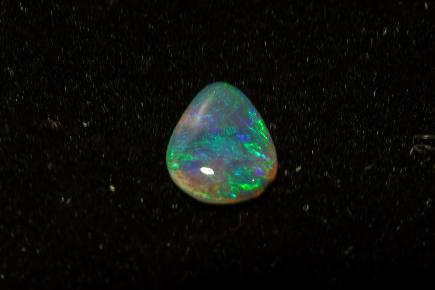 0.55 ct Black Opal 8 x 6.3 x 1.6 mm