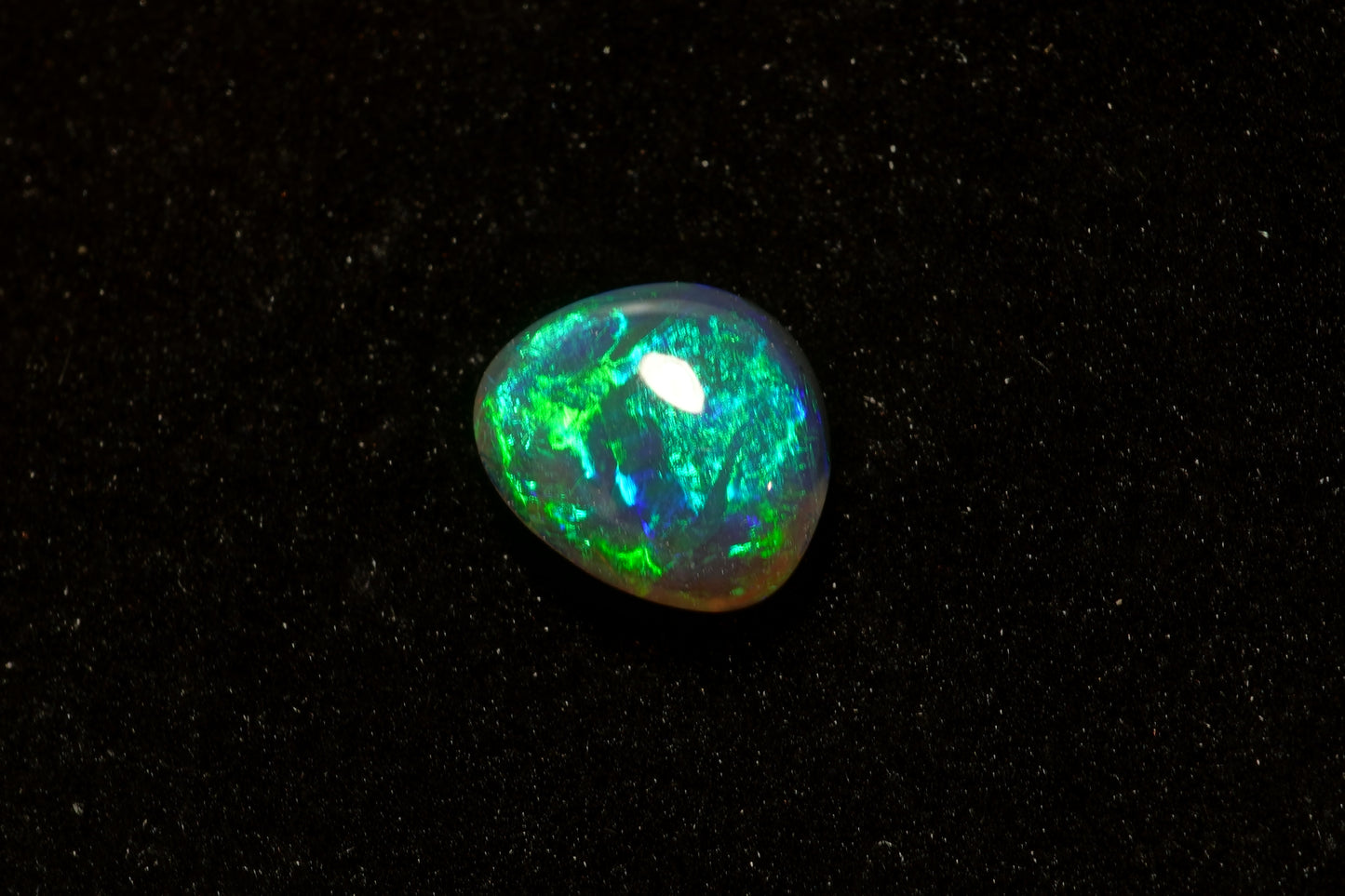 0.69 ct Black Opal 7.3 x 6.2 x 2.5mm