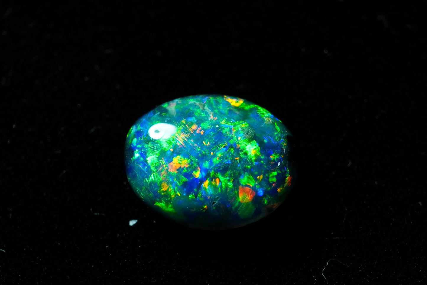 0.64 ct Black Opal 7 x 5.4 x 2.4 mm