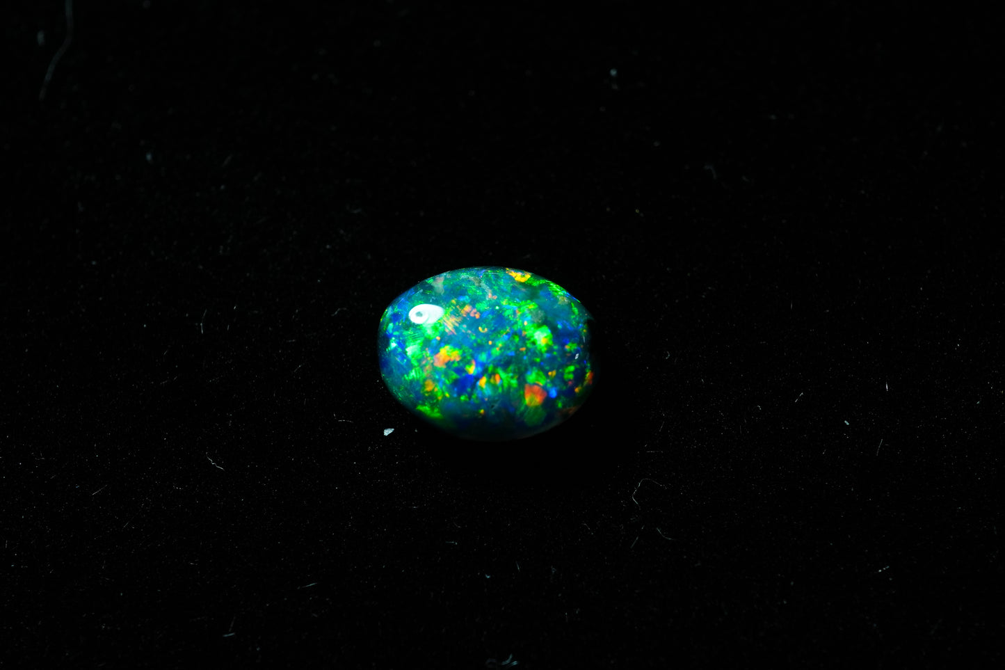 0.64 ct Black Opal 7 x 5.4 x 2.4 mm
