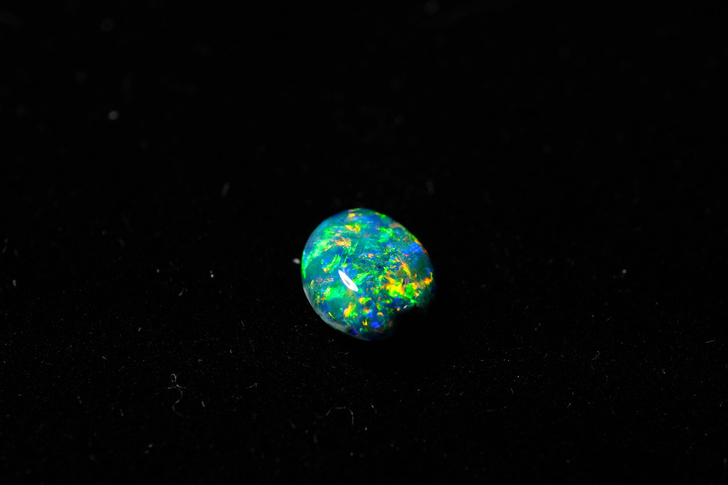 0.64 ct Black Opal 7 x 5.4 x 2.4 mm