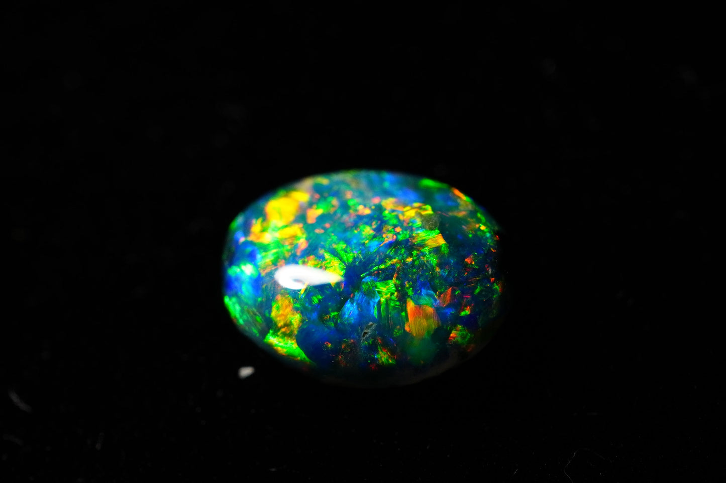 0.64 ct Black Opal 7 x 5.4 x 2.4 mm