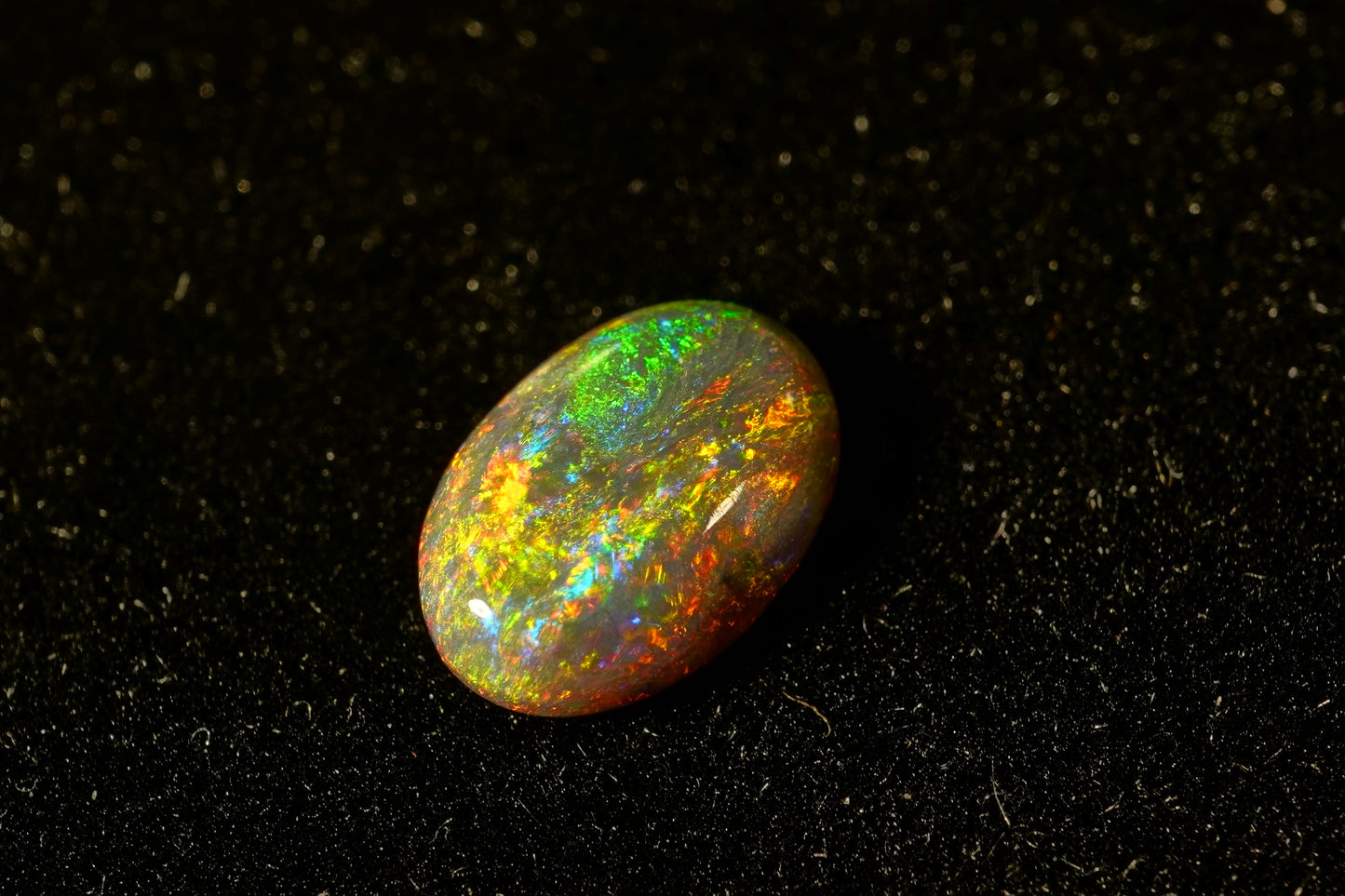 0.97 ct Black Crystal Opal 8.5 x 6 x 2.5mm