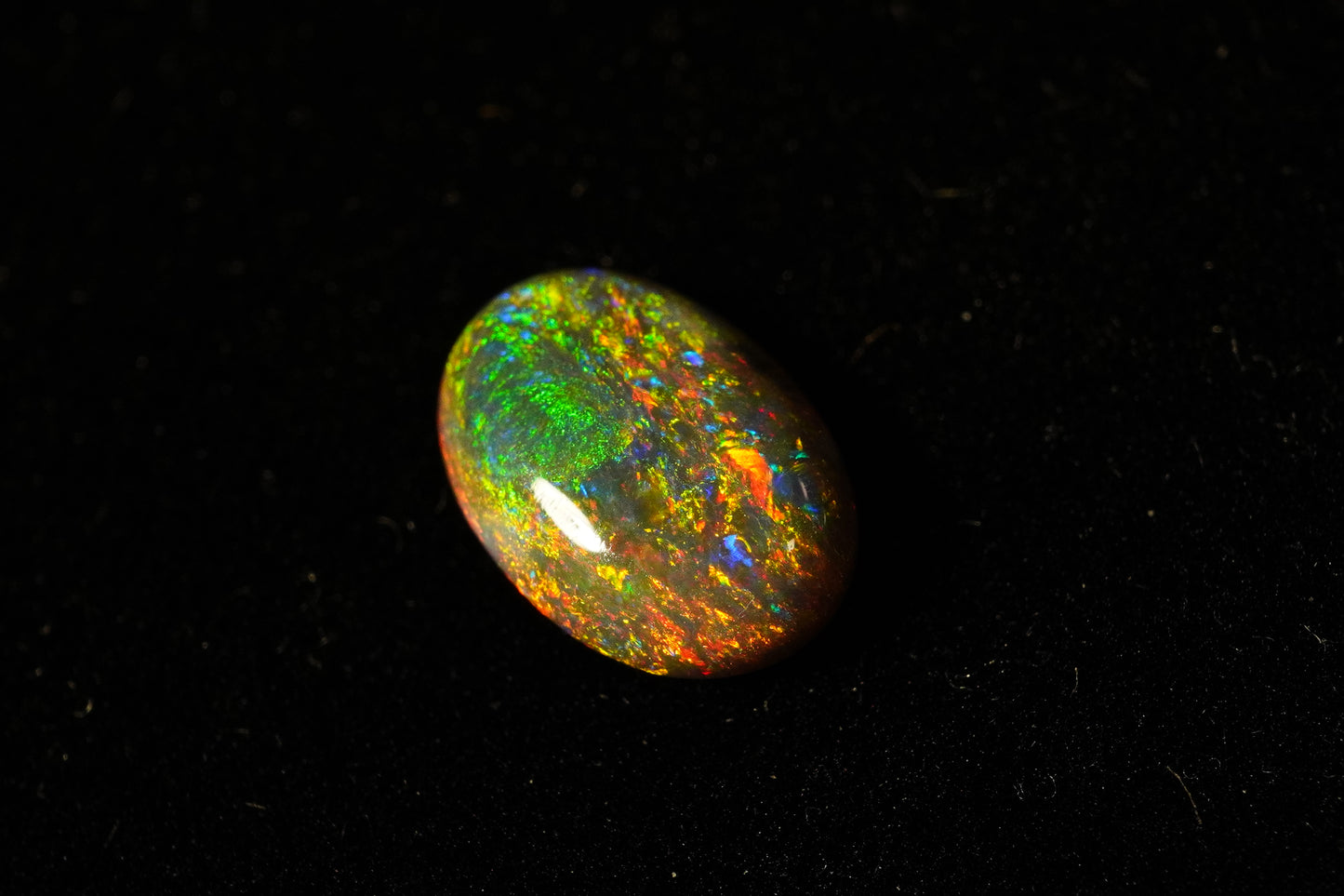 0.97 ct Black Crystal Opal 8.5 x 6 x 2.5mm